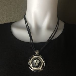 Suede with silver tone necklace--(yin-yang style)